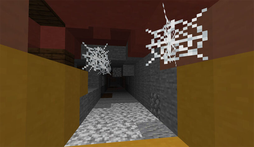 Cobwebs in a mesa mine in Minecraft