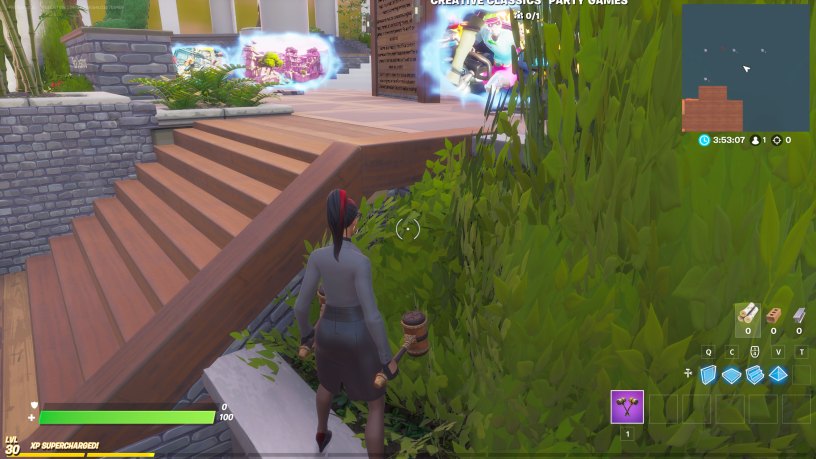 Beach ball location behind stairs in Fortnite