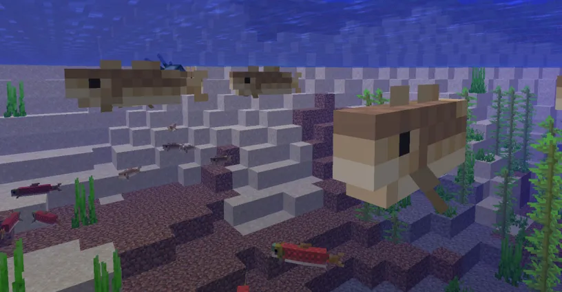 Cod and Salmon swimming in the water in Minecraft