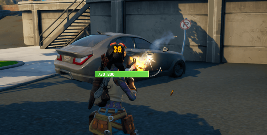 A Fortnite character destroying a car for mechanical parts.