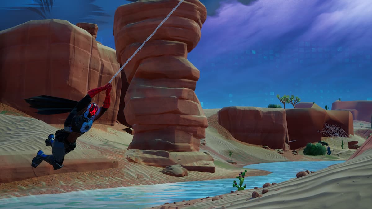 Where to use SpiderMan's Shooters to swing under an arch at Desert