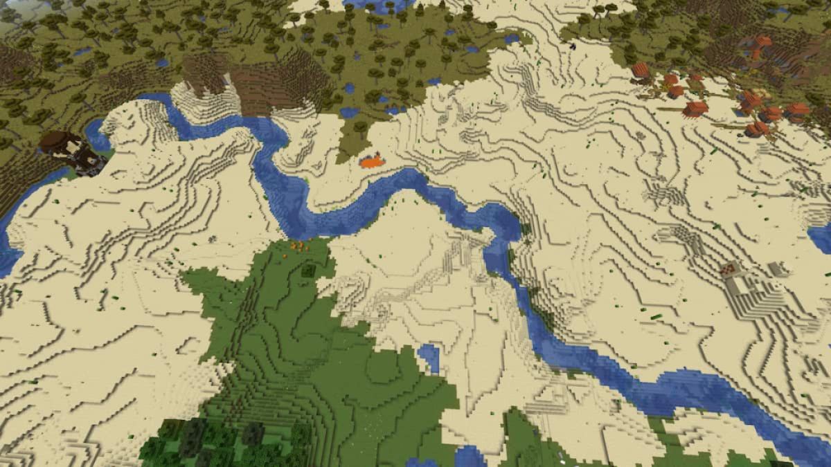 A large Minecraft Desert near greener biomes with multiple structures.