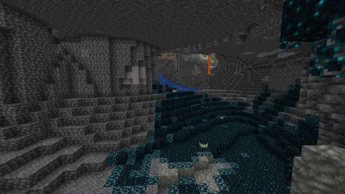 A Deep Dark niome with a lava fall and a Lush Cave in the background.