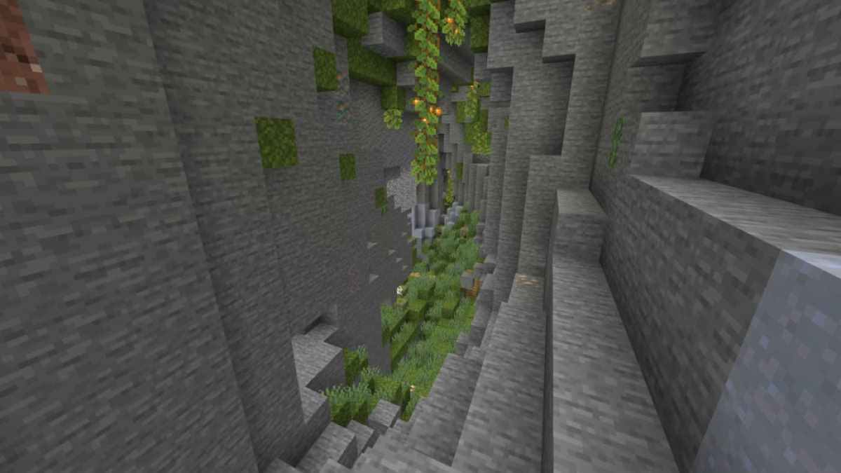 A narrow Lush Cave complete with moss and glowberries.