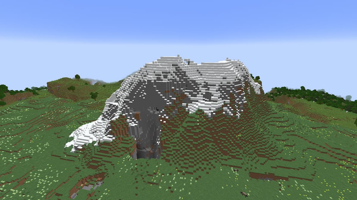 A Minecraft seed with a small Mountain next to the spawn area.