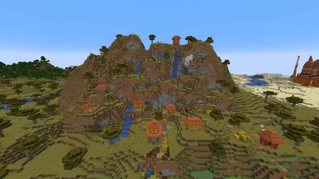 A Savanna with a village near a Desert.