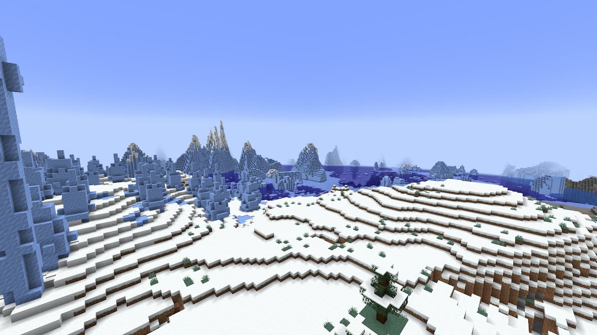 A Minecraft Snowy Plains biome alongside Ice Spikes and a Frozen Ocean.