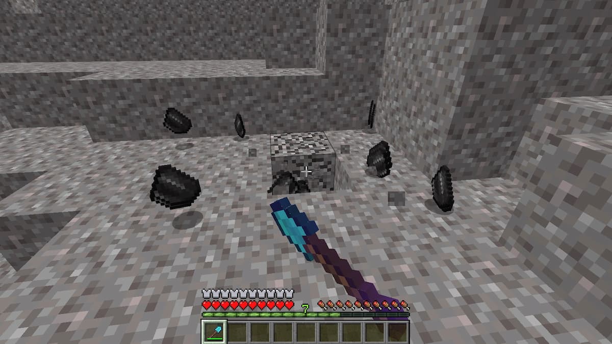 Using a shovel enchanted with Fortune to get more flint in Minecraft.