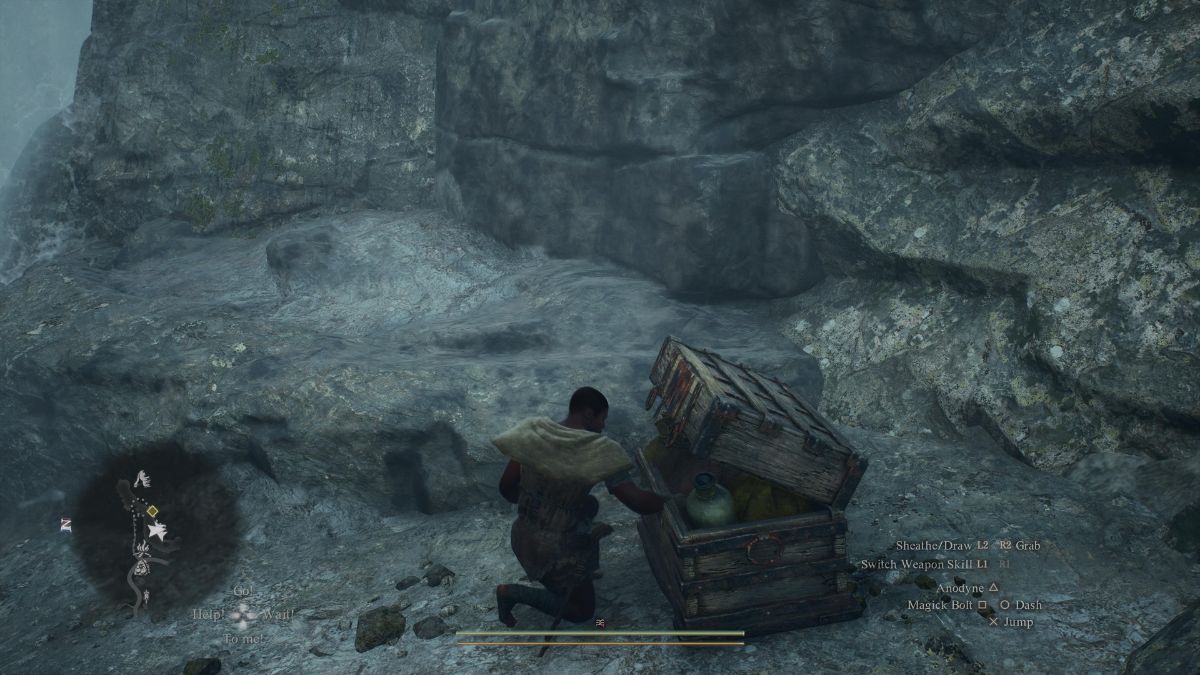 The Arisen opens a chest at the Borderland Campground waterfall in Dragon’s Dogma 2