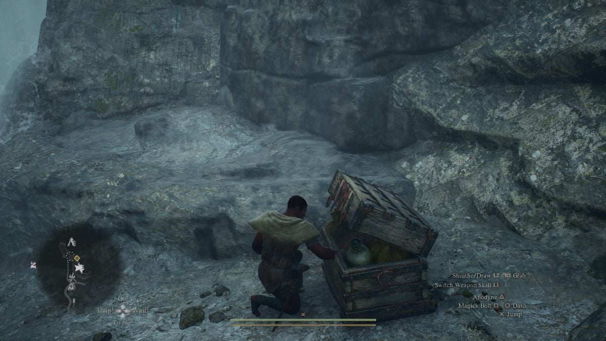 The Arisen opens a chest at the Borderland Campground waterfall in Dragon's Dogma 2