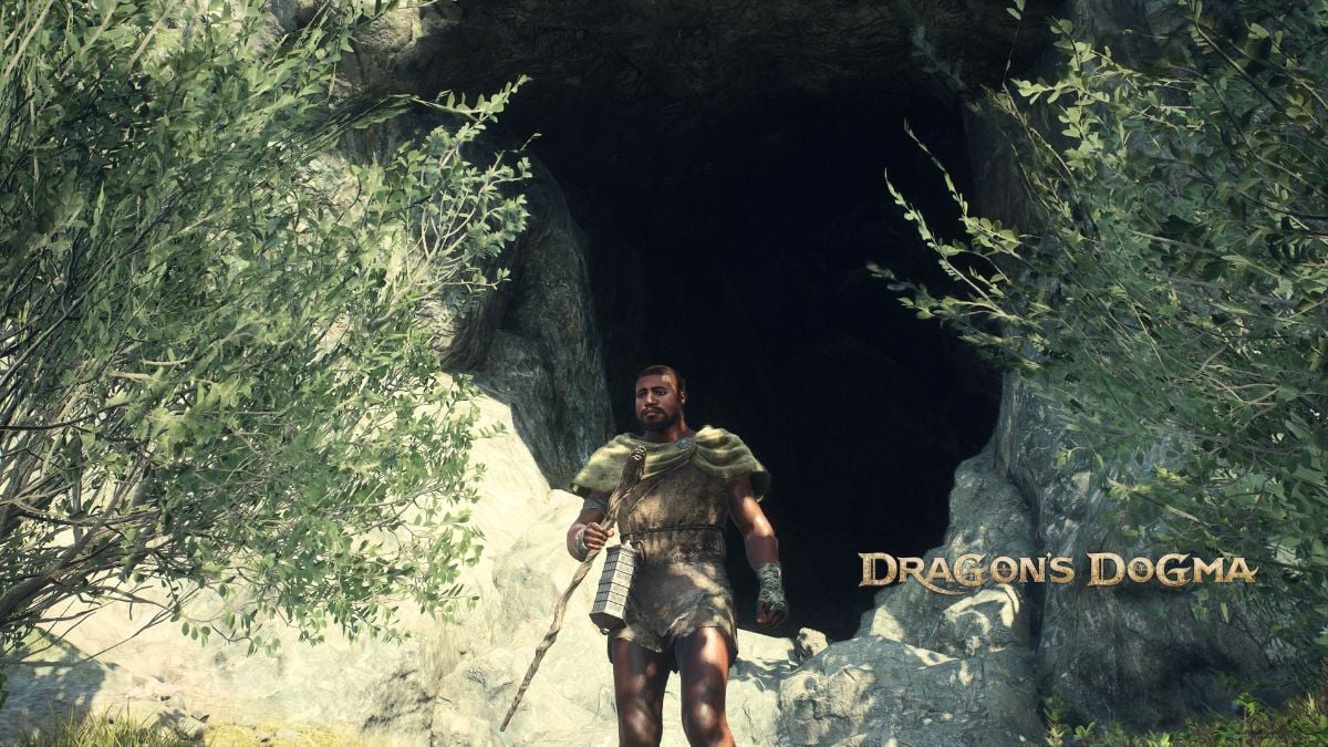 The Arisen stands in front of a cave entrance