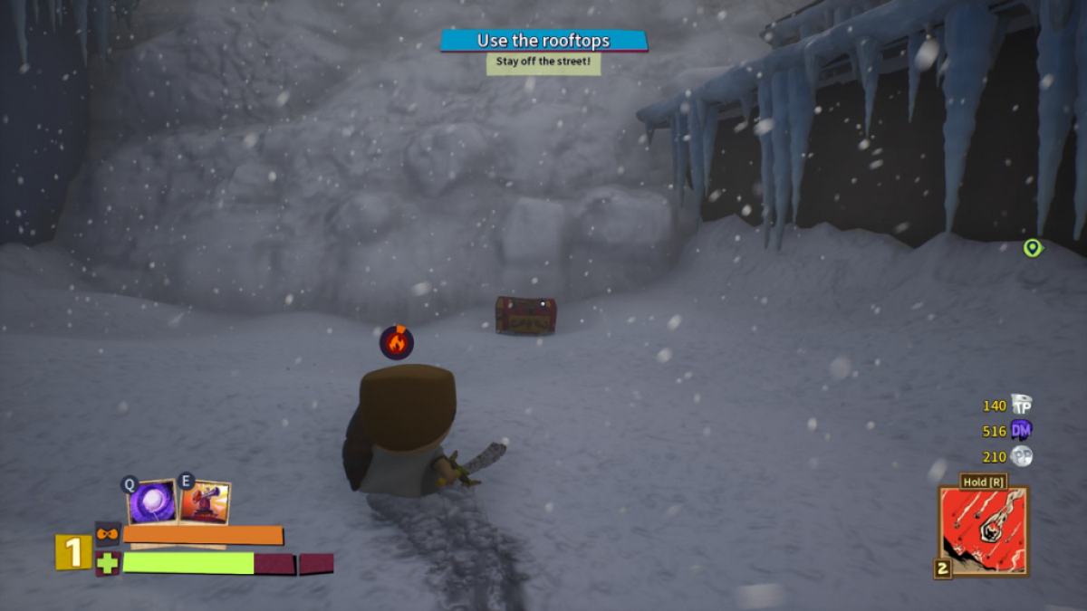Player looking at a snow wall behind a treasure chest in South Park Snow Day