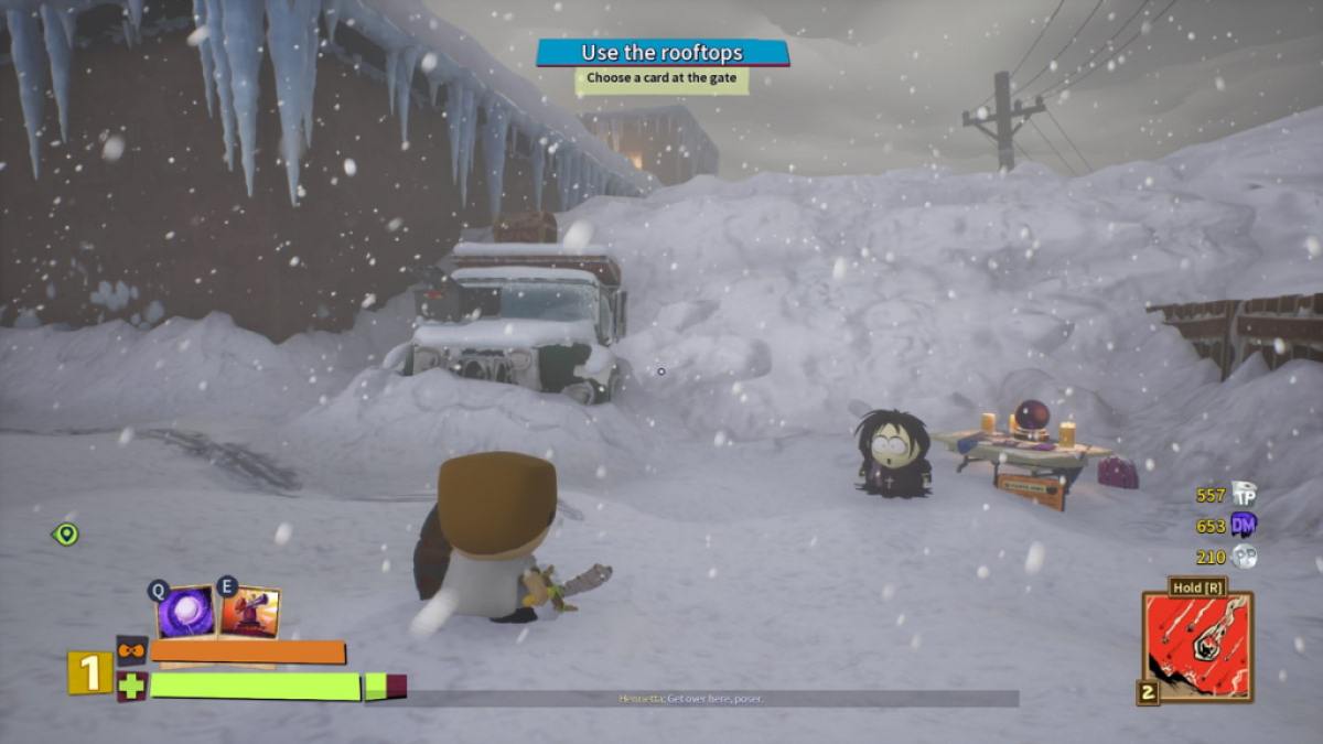 Player looking at a treasure chest placed on top of a truck in the Main Street area in mission two of South Park Snow Day