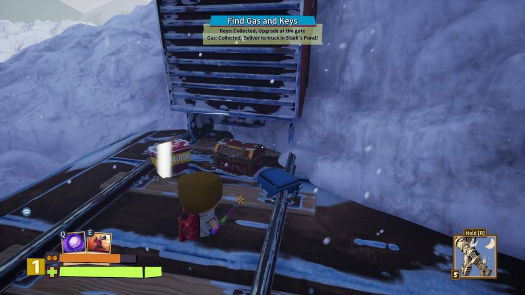 Player looking at a backpack and a treasure chest on train tracks in South Park Snow Day