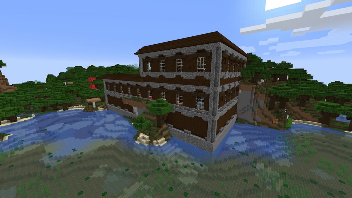 A Minecraft Woodland Mansion next to a Swamp.