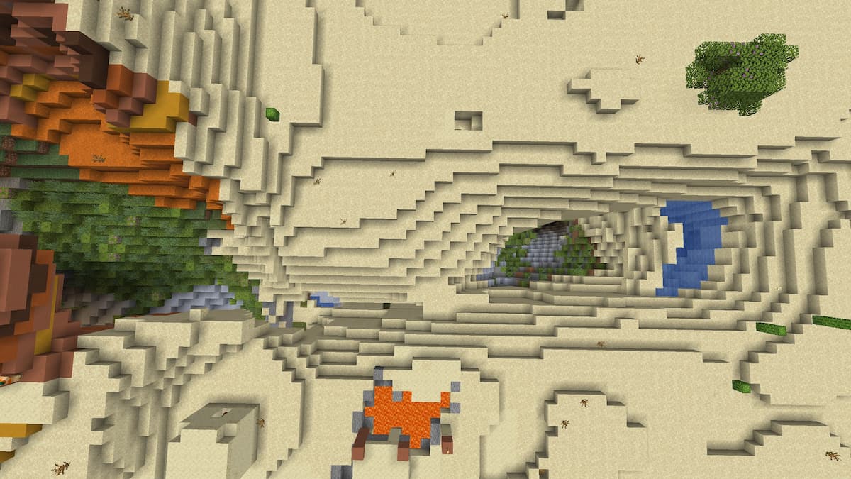 A large Lush Cave near a Desert Village and a pool of lava.