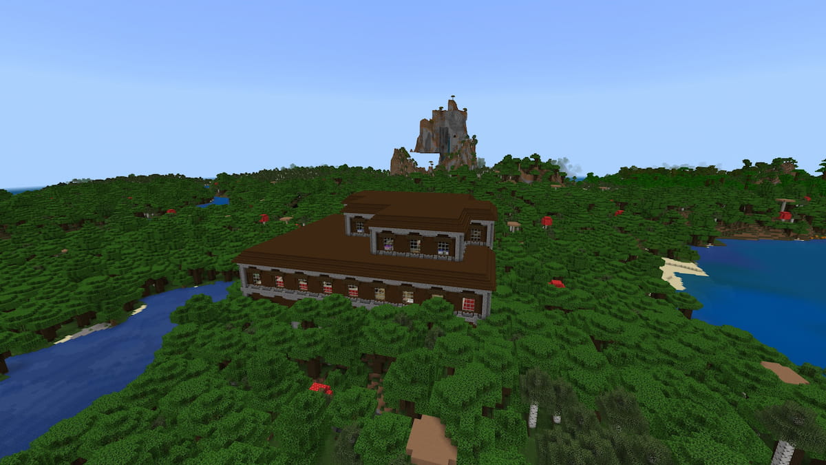 A Woodland Mansion in front of Windswept Hills in Minecraft.