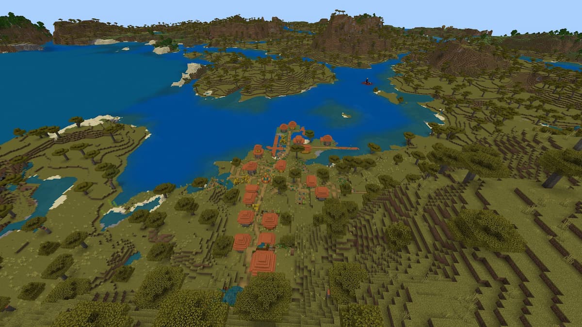 A large river in a Savanna biome with a Savanna Village and a ruined portal