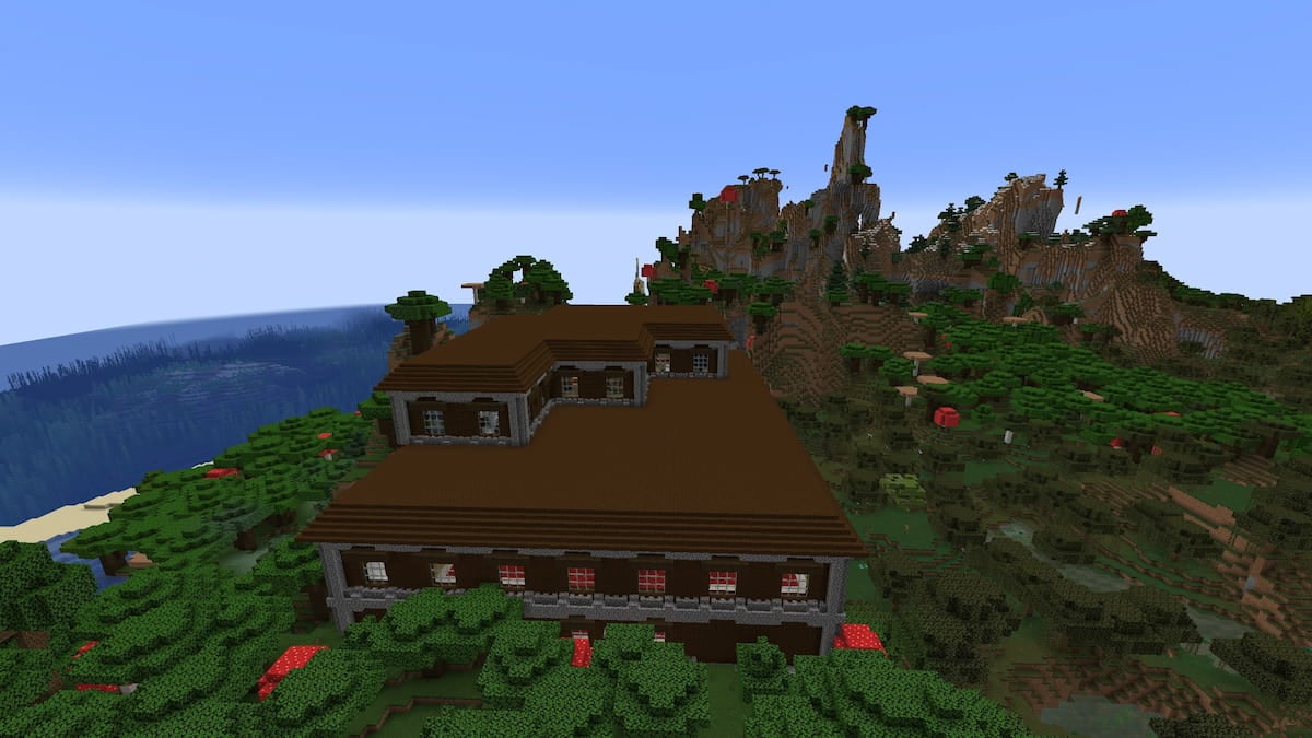 A Woodland Mansion in front of a Windswept Forest biome
