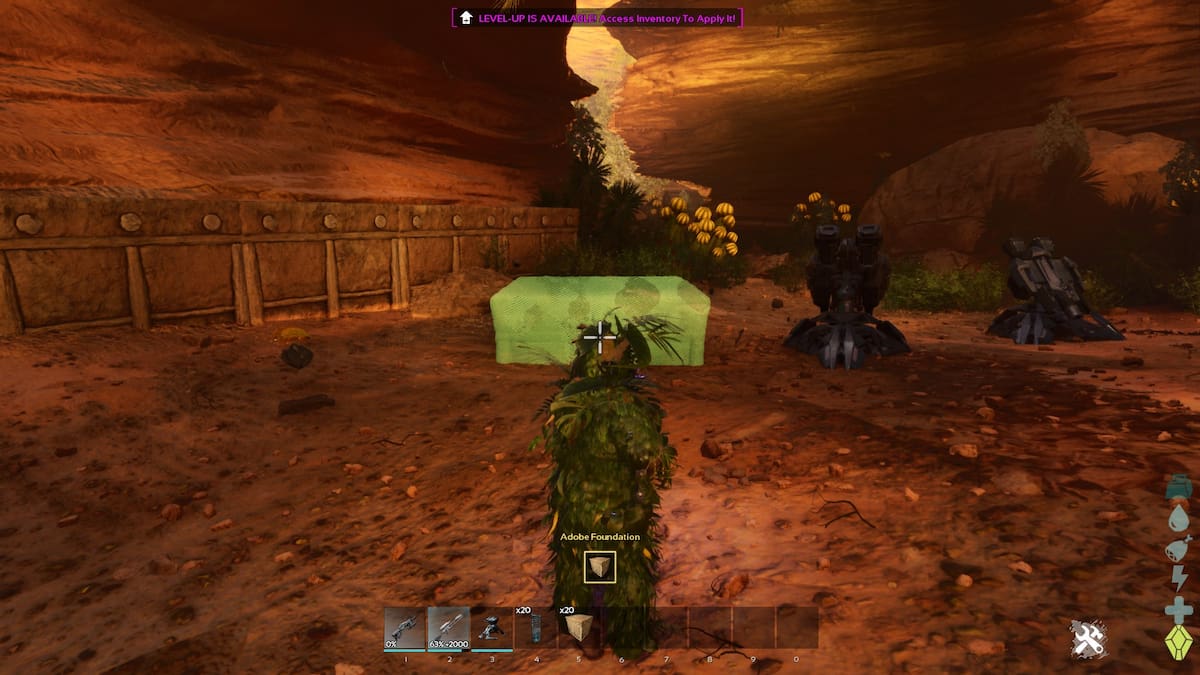 Player placing Adobe Foundations and turrents in ARK Scorched Earth Ascended