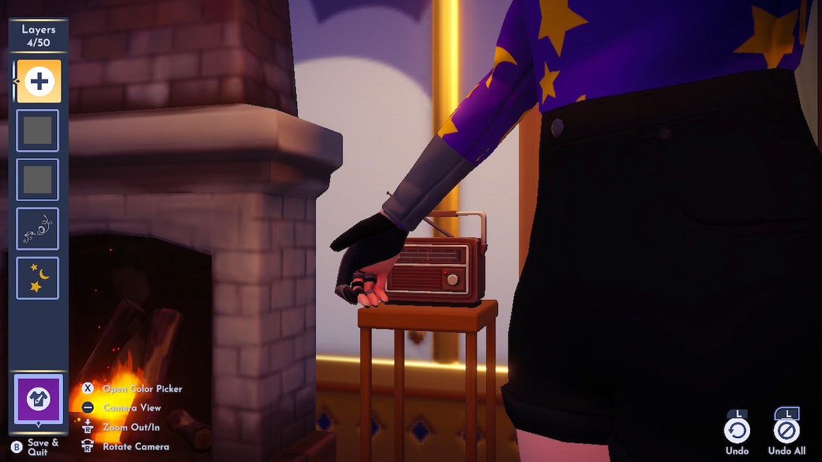 A screenshot showing a close-up of a fem-presening Disney Dreamlight Valley avatar wearing a purple turtleneck customized in Touch of Magic. It has large, gold moons and stars across it. The close-up shows the arm of the design, where a new motif has been used to cover the wrist of the design in a different color.