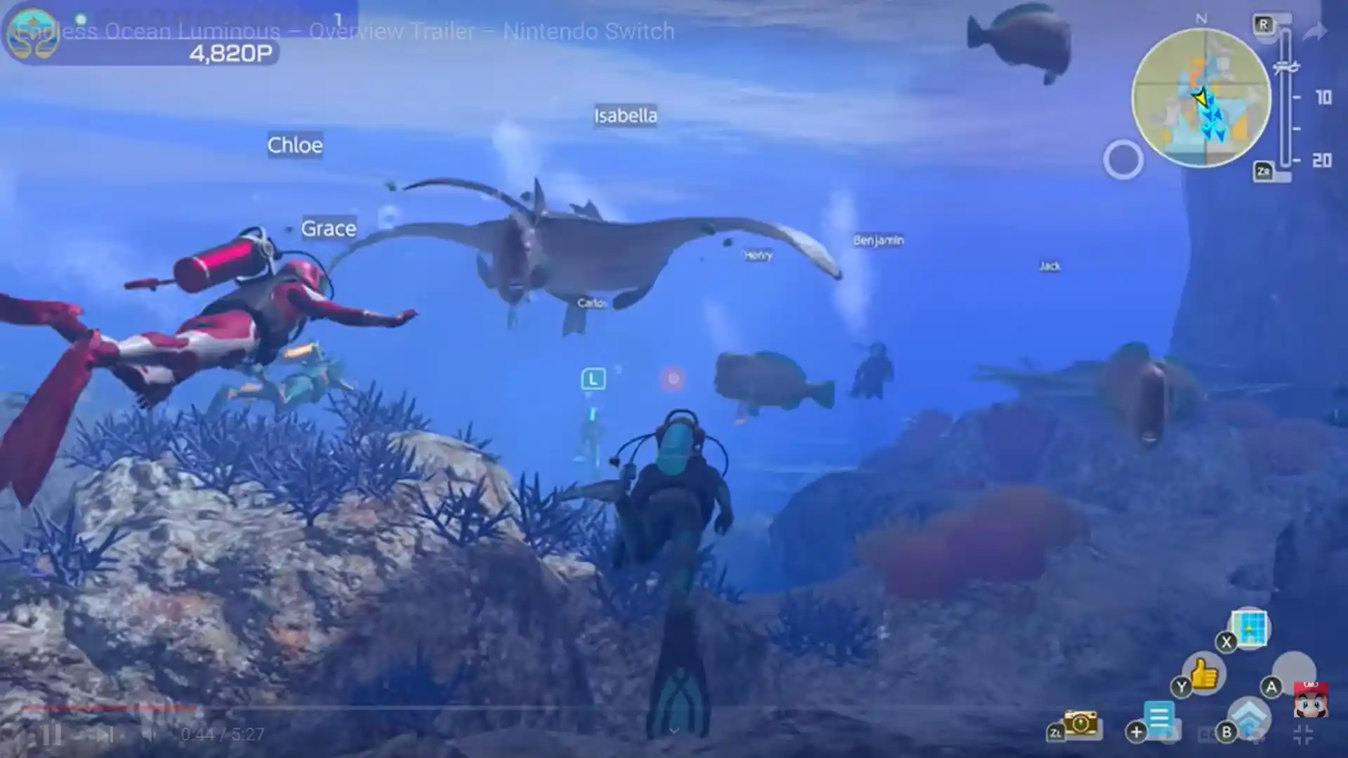 A screenshot of the Endless Ocean Luminous title screen from Nintendo of American's official overview trailer upload. It shows several divers swimming together, following a Stingray swimming off into the distance. Above the players are each of their names.