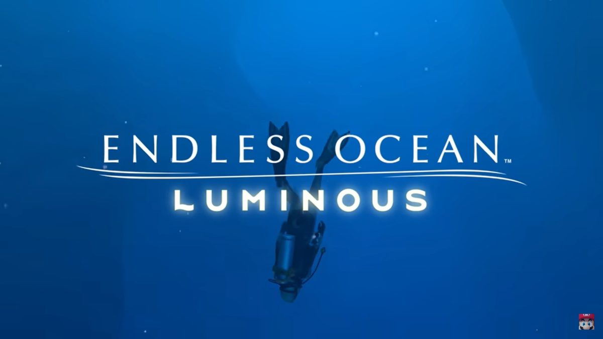 A screenshot of the Endless Ocean Luminous title screen from Nintendo of American's official overview trailer upload. It shows the title of the game in the centre, in front of a silhouette of a diver swimming down into the ocean depths.
