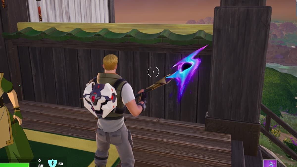 Fortnite player standing in front of the fence at an Elemental Shrine
