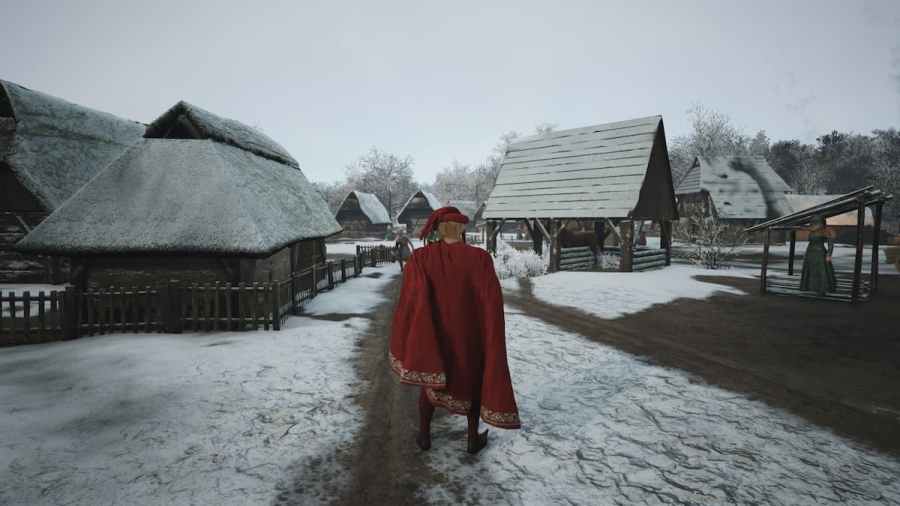 Manor Lords player walking the streets covered in snow
