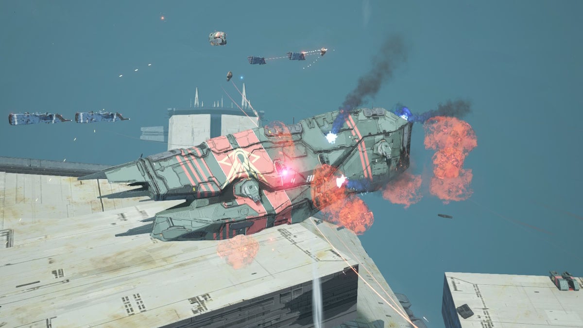 A capital class spaceship on fire and sustaining damage.