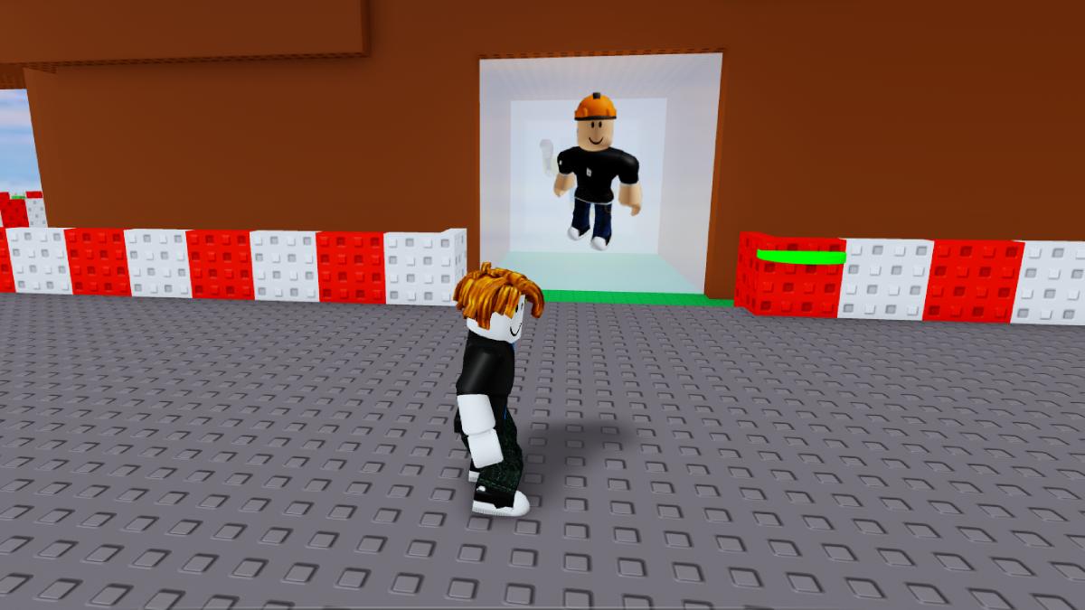 A barrier with a Roblox character image engraved on it