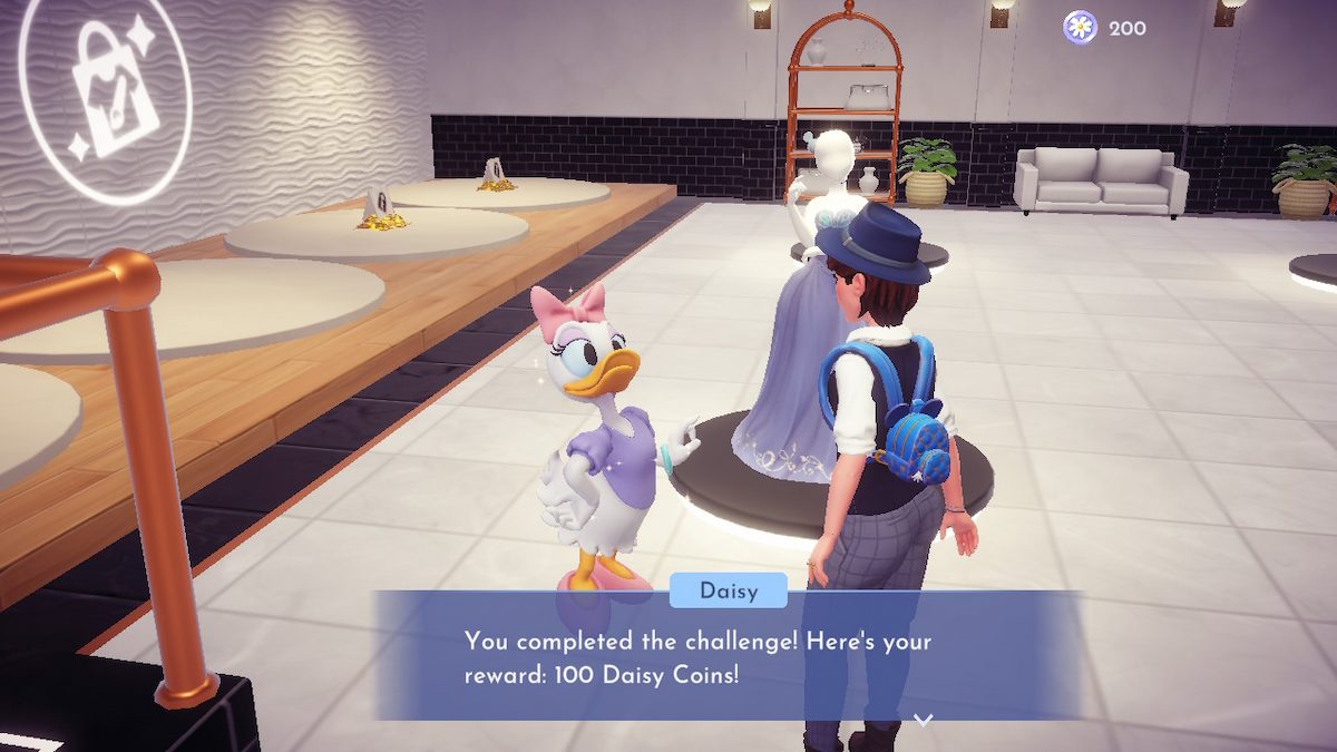 A fem-presenting Disney Dreamlight Valley avatar talking to Daisy Duck inside Daisy's Boutique.