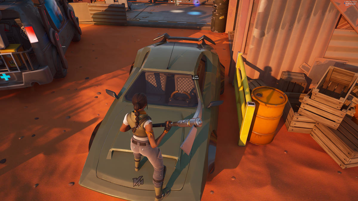 Fortnite player standing on a car