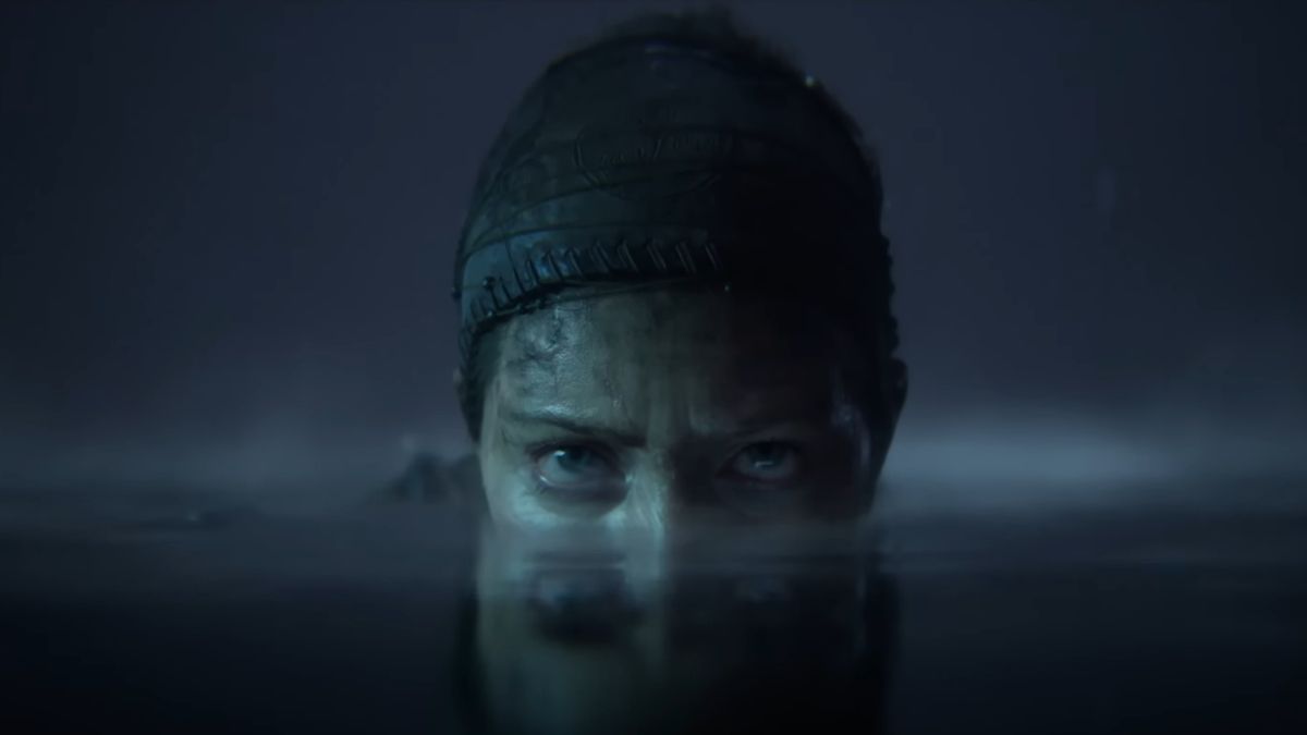 Senua from Hellblade 2 with her head half submerged in water