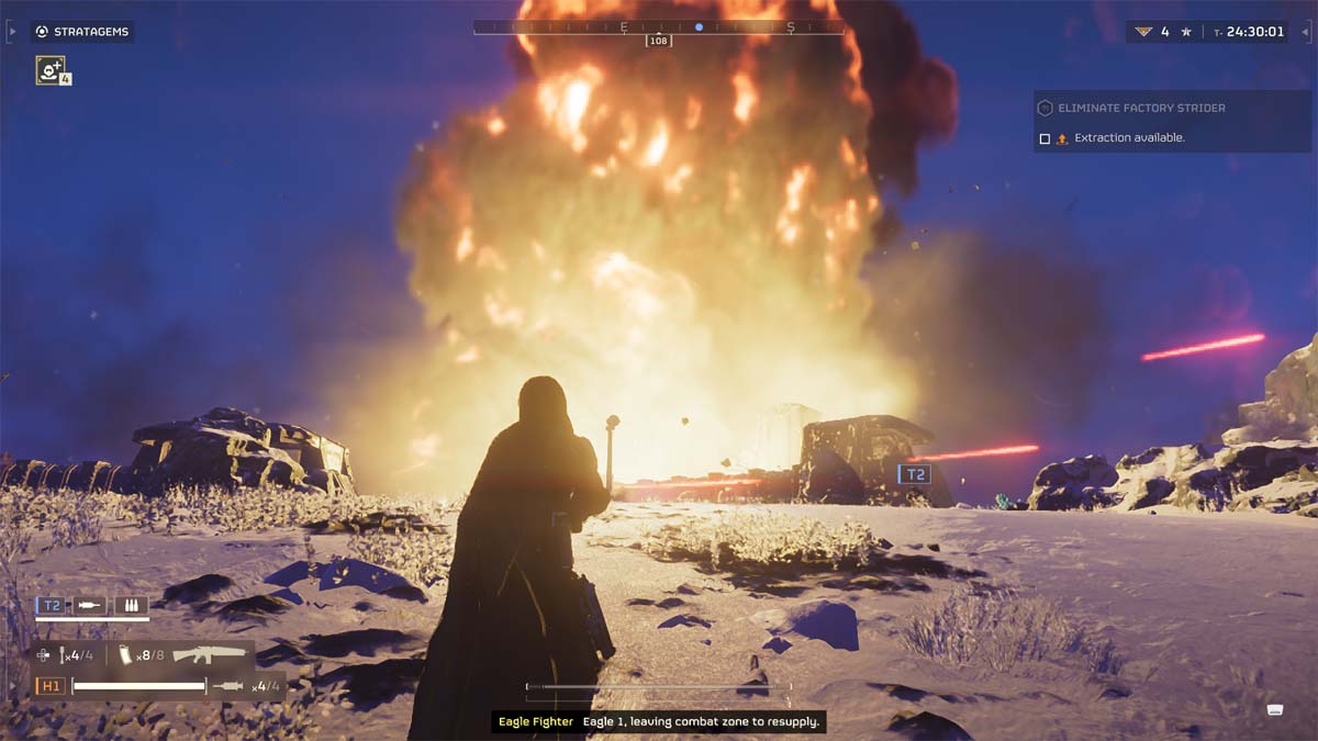 A 500kg bomb exploding with a character silhouette in Helldivers 2.