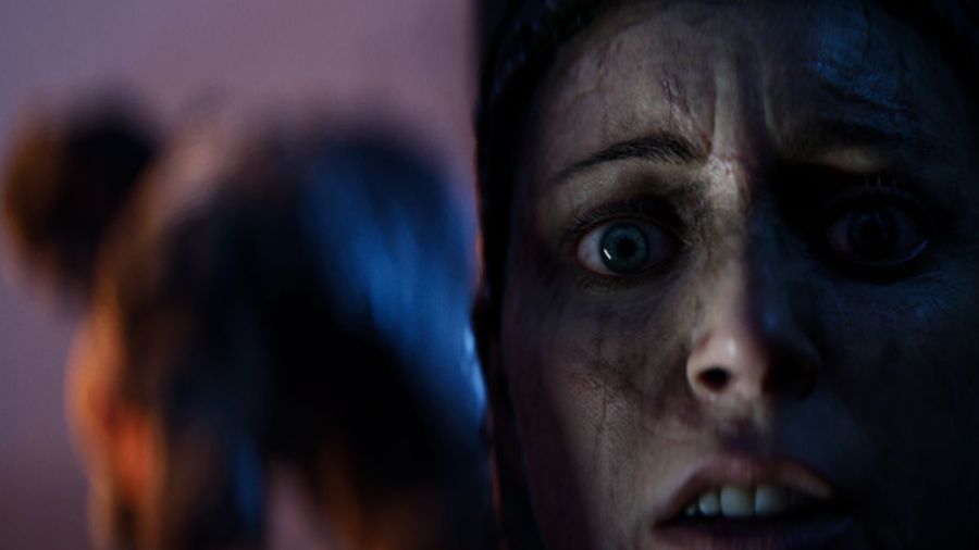 Senua looking at the screen with fear in Senua's Saga: Hellblade II