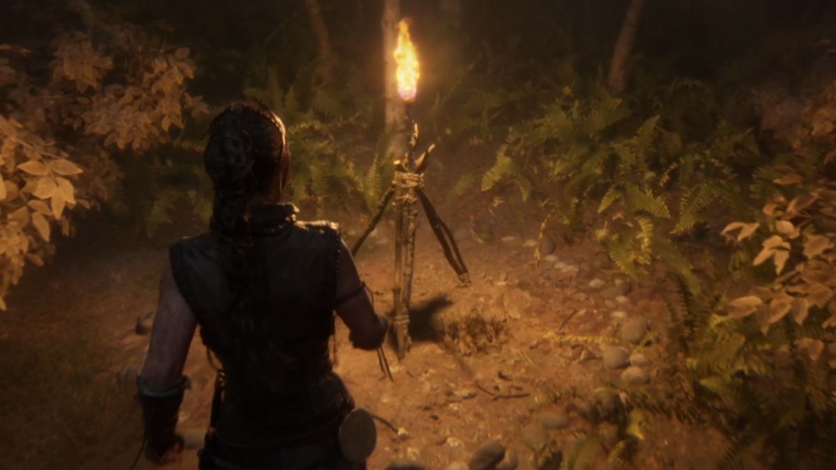 A torch to light the path in the Shadow realm in Senua's Saga: Hellblade II