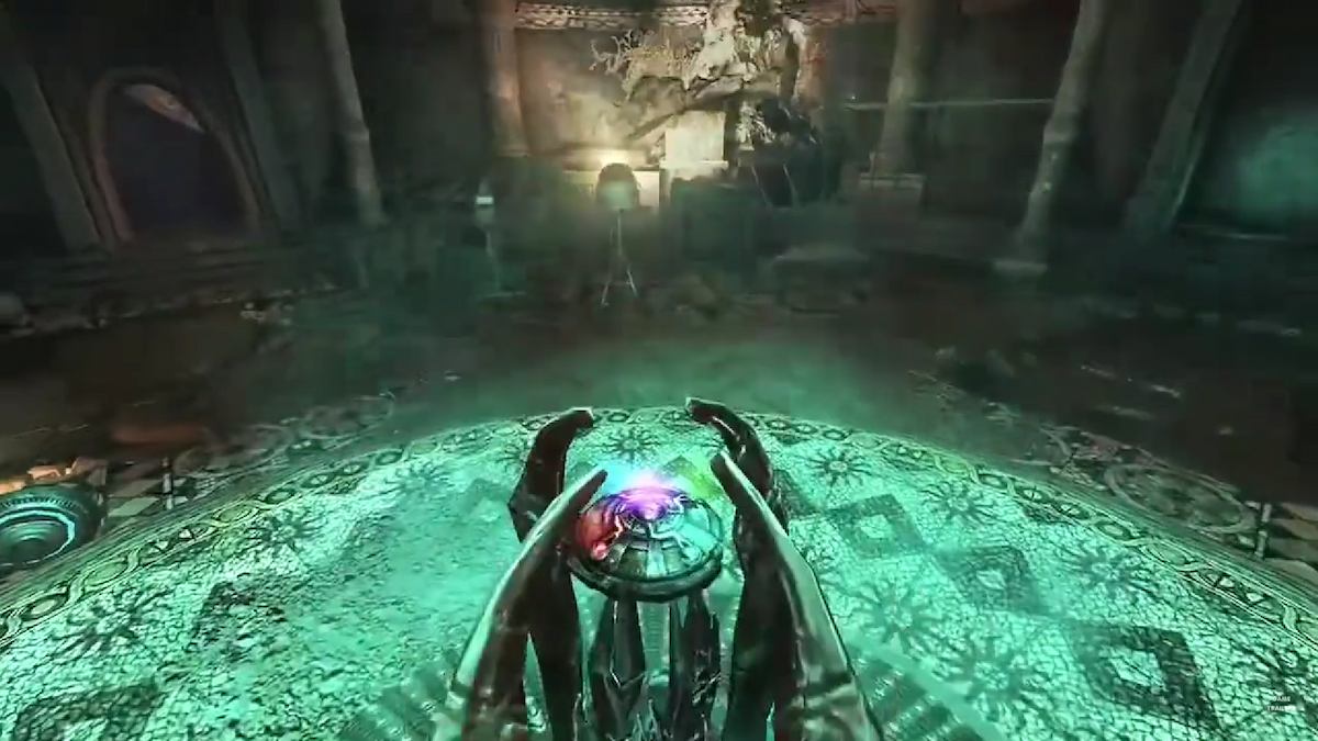 A gem rises from the ground, surrounded by a glowing green circle in the Wolfenstein trailer. 