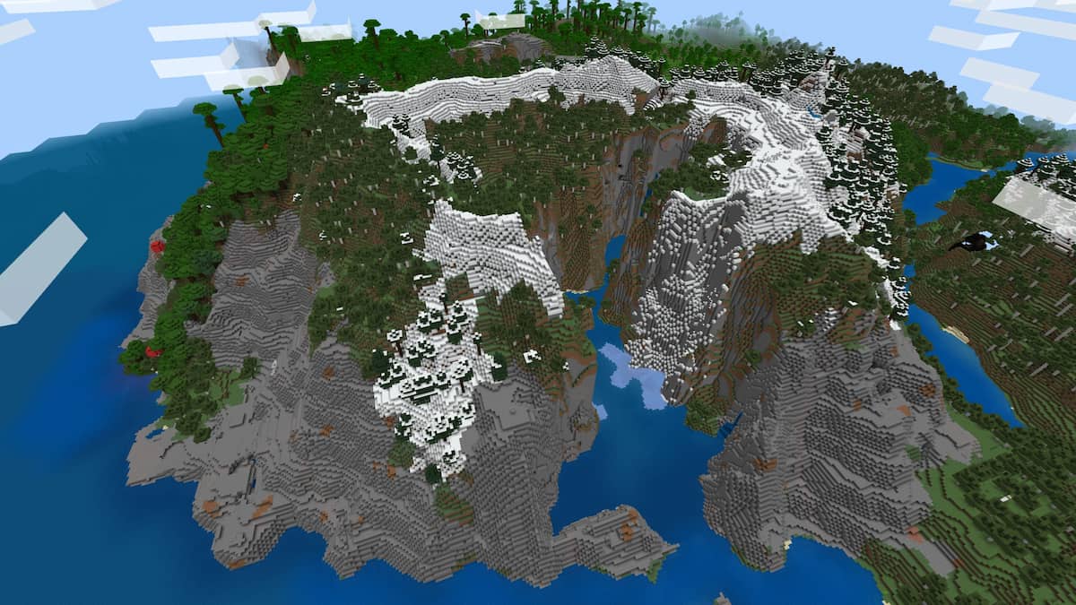An Ocean biome cutting through a tall stony mountain in Minecraft