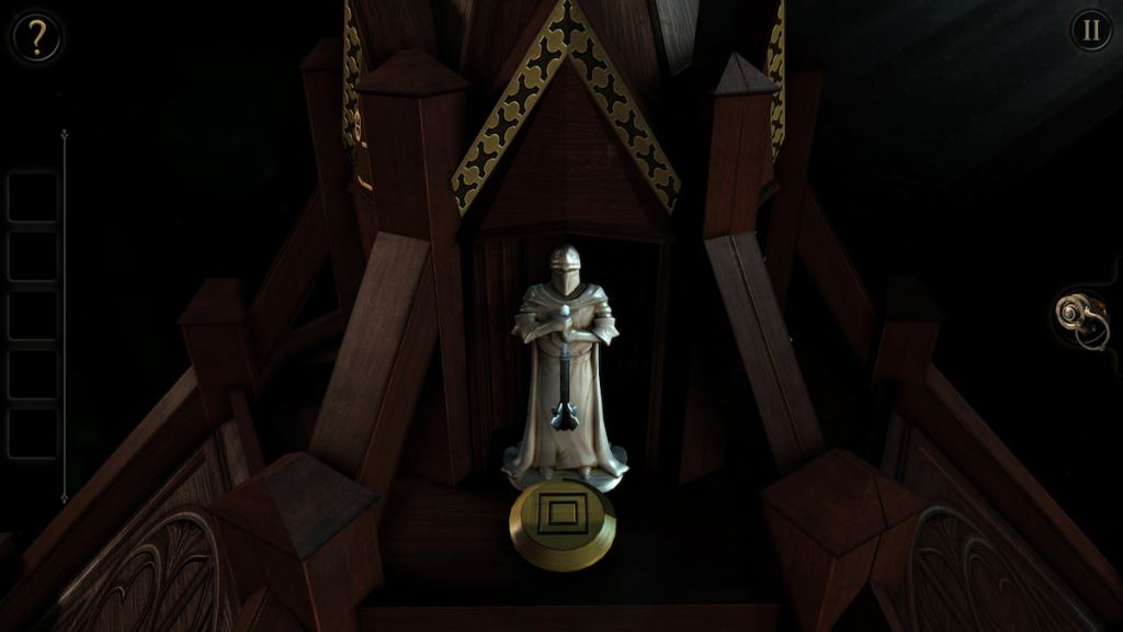 The location of the square button in front of the knight statue in The Room