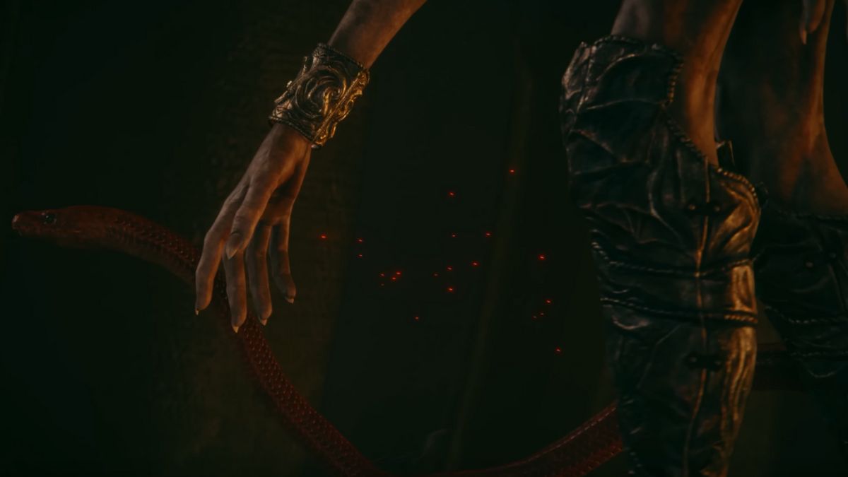 Mysterious hand petting a red serpent in Elden Ring Erdtree DLC