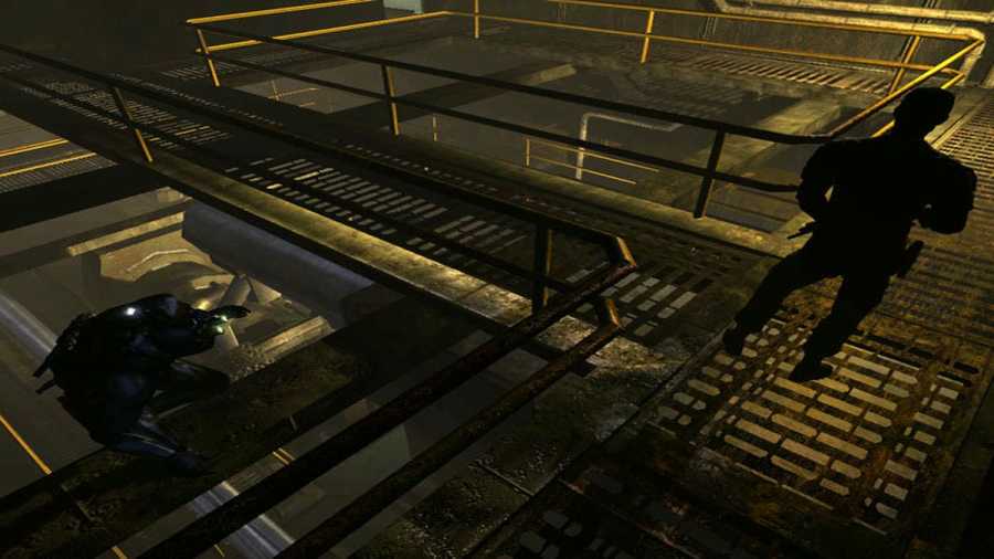 Splinter Cell Chaos Theory Sam Fisher sneaking up on an enemy