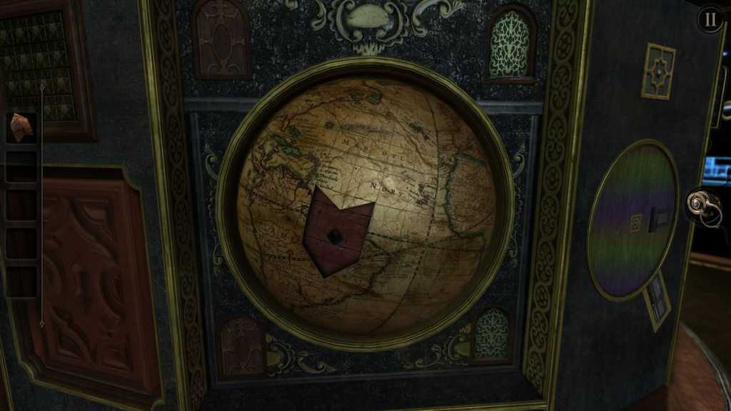 A flag-shaped hole in the globe at the front of the box