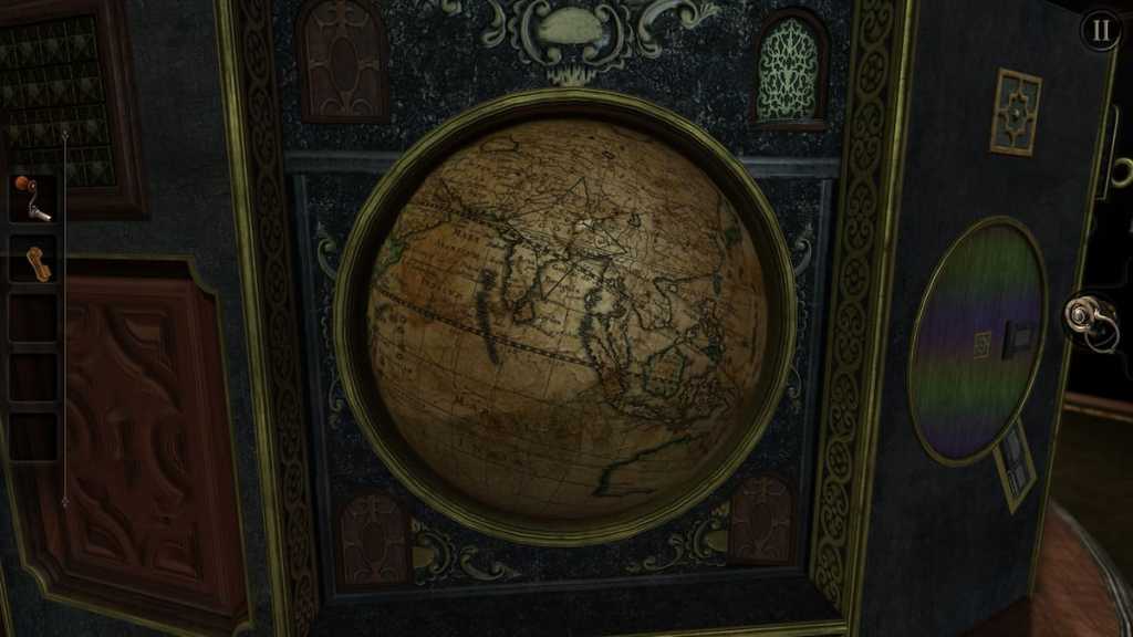 Placing the star-shaped map piece into the hole in the globe