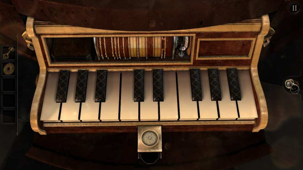 The opened coin slot beneath the piano