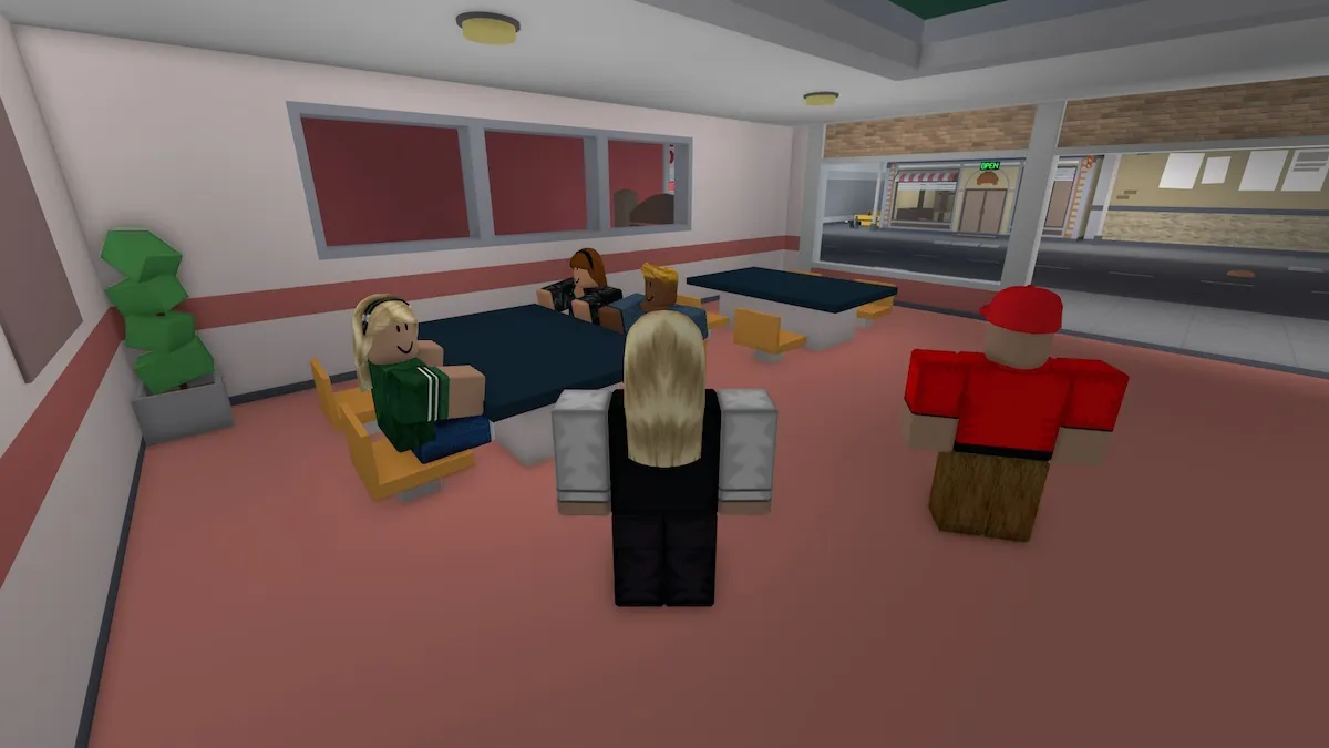 Serving a table in Roblox Cook Burgers.