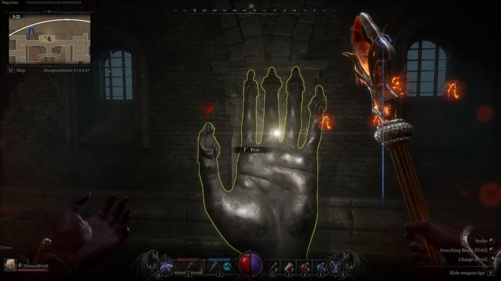 The hand-shaped statue holding the Divine Crown fragment in Dungeonborne
