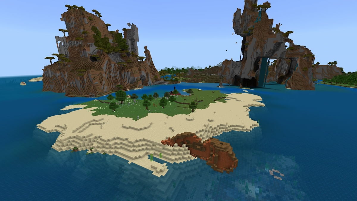 A Minecraft beach with a shipwreck, a ruined portal, and a Cold Ocean Ruin