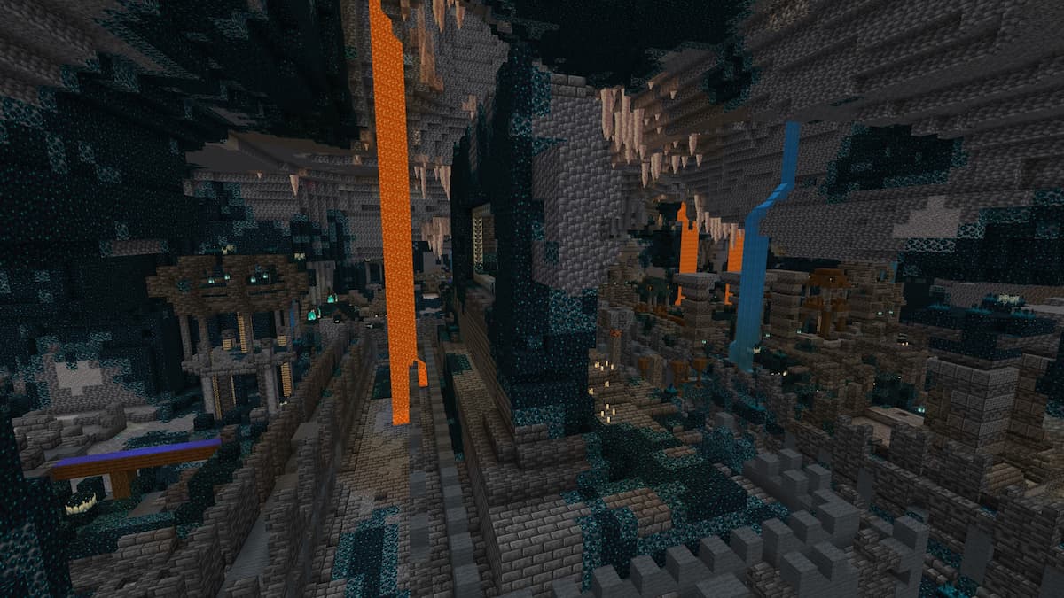 An Ancient City surrounded by dripstone and lava in Minecraft