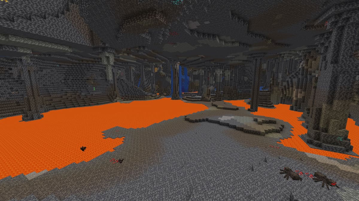 A large deepslate cave with pools of lava in Minecraft